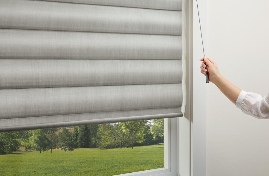 short retractable cord adjusts window coverings with child safety