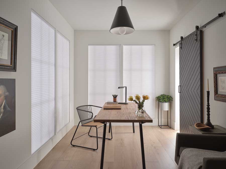 light filtering shades on windows of home office in London, Ontario home